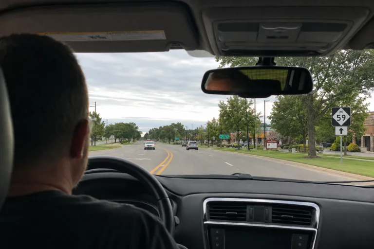 Driver's-eye view from the passenger seat on M-59 in Oakland County, Michigan