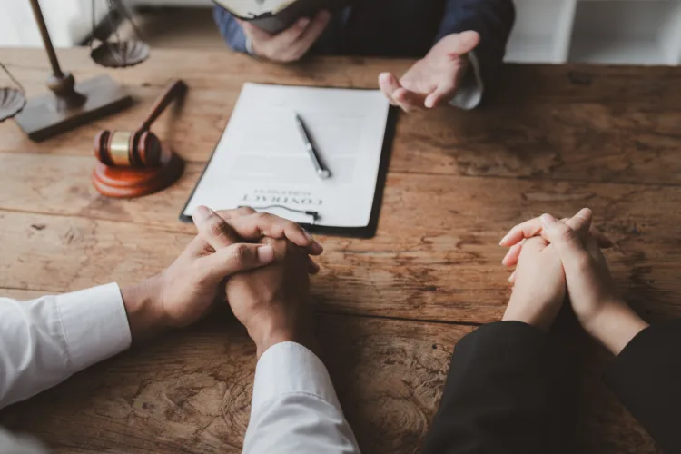 Michigan underage DUI lawyer consulting with parents about their child's case