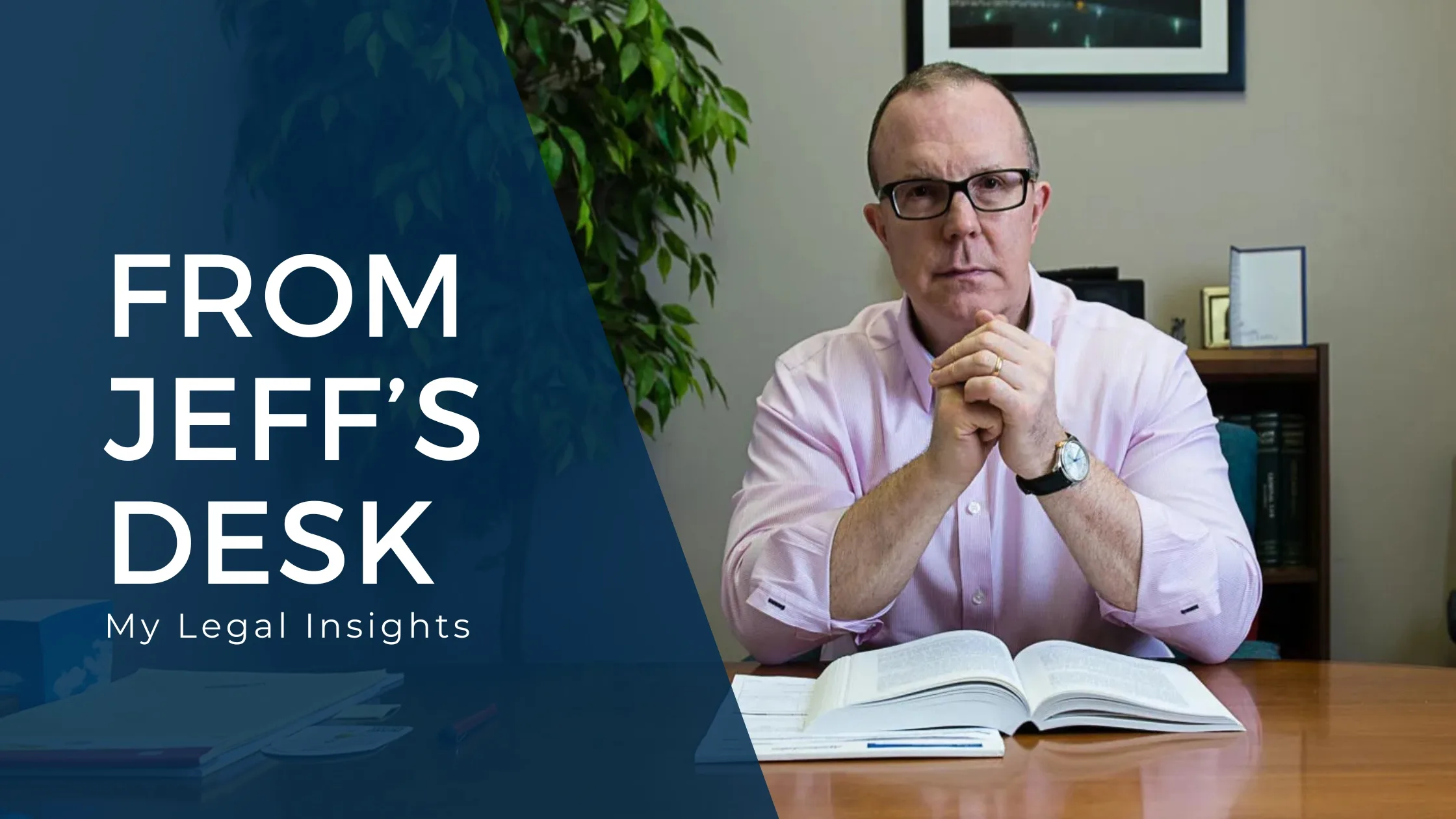 Jeffrey Randa, Michigan criminal defense attorney, sitting at his desk.