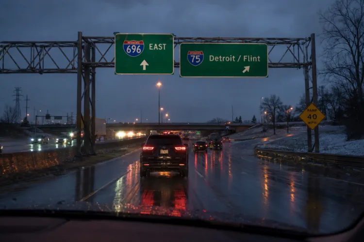 I-696 East and I-75 highway signs at night — an Oakland County DUI lawyer sees cases start on roads like these